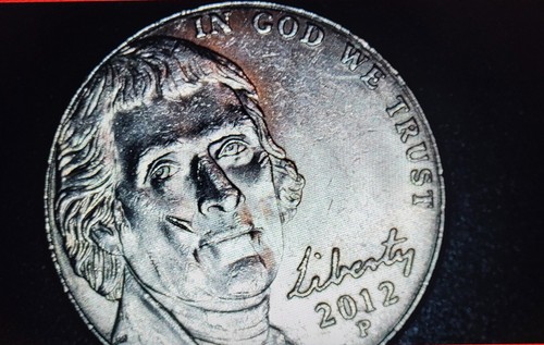 2012-D Jefferson nickel die crack error showing raised metal line crossing the coin's design