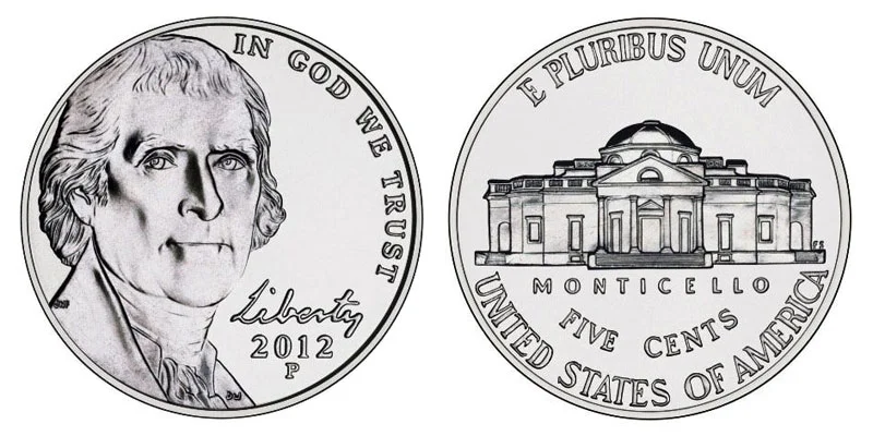 Grading strip showing four 2012 Jefferson nickels progressing from worn to gem uncirculated condition